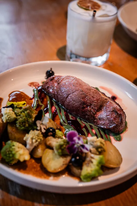 The signature dish: roast duck, romanesco and confit potatoes